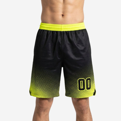Black custom basketball shorts with neon yellow halftone fade gradient and ribbed elastic waistband, player number 00 on front leg, men's front view