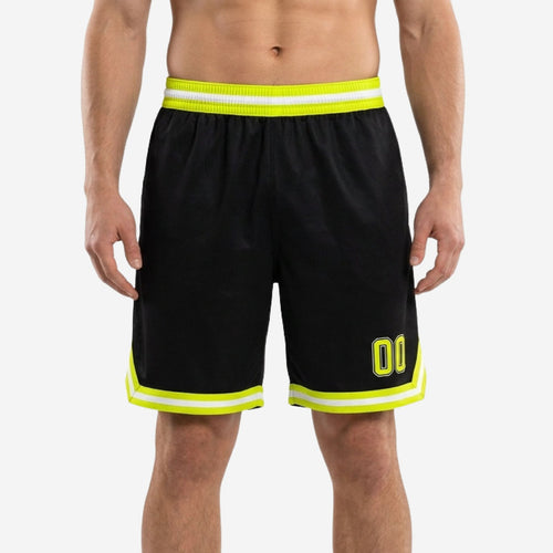 Black custom basketball shorts with neon yellow and white chevron hem trim and striped waistband, player number 00 on left thigh, front view