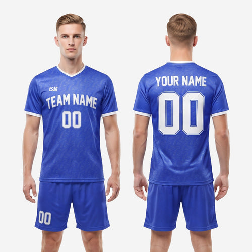 Close detail of custom blue and white soccer uniform showing white contrast trim at V-neck collar and sleeve cuffs