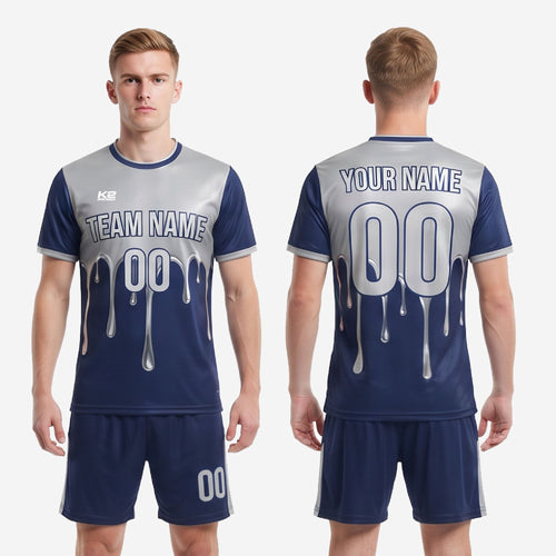 Blue and white soccer uniform back view showing player name and number print zones on full-dye sublimated navy jersey