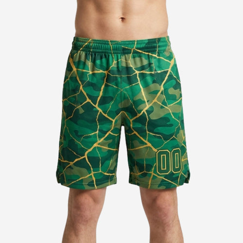 Custom green basketball shorts with gold crackle camo print and player number 00 on the lower left leg, front view