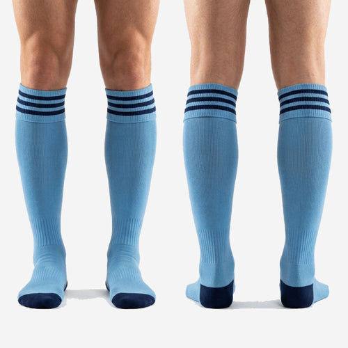 Full-length pair of custom light blue soccer socks with navy stripes, over-the-calf length for squad orders