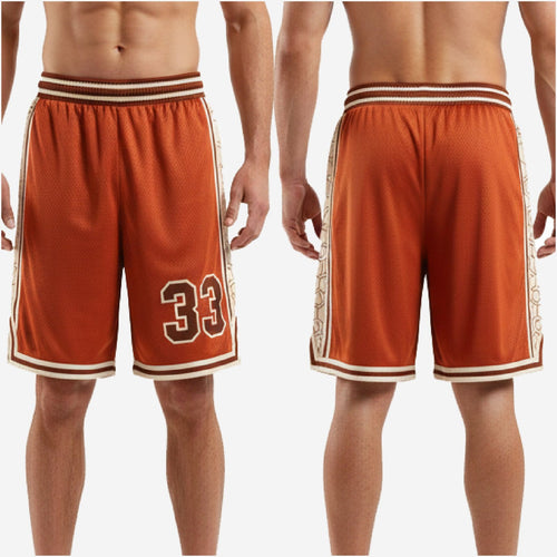 Size and spec sheet for custom orange basketball shorts available in youth through adult roster sizing