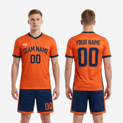 Custom orange soccer uniform full kit back view showing player name and number print zones