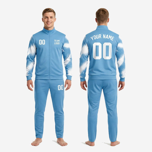 Custom sky blue and white soccer tracksuit back view showing name arc and number placement on jacket and pants