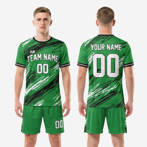 Full custom soccer uniform set in green and black with scratch graphic, jersey and shorts included