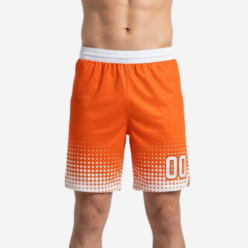 Orange basketball shorts with white halftone dot fade and player number on front leg panel, men's custom sublimated team shorts