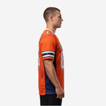 Front view of orange and navy custom American football jersey with arched team name and large front number 23 on adult male model