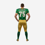 Back view of custom american football team uniforms in green and gold showing back number 75 and nameplate area above the number on a male player