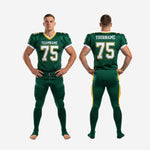 Detail view of green and gold sublimated american football uniform showing white crew neck binding and gold-outlined number on shoulder panel