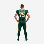 Forest green and gold custom team football uniform, front view showing chest team name, front number, and gold-outlined sleeve number on sublimated jersey
