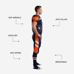 Back view of navy football uniform set showing back number placement, nameplate area, and diagonal white brush-stroke pant panel accents