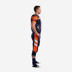 Navy and orange custom football uniform front view showing V-neck collar, lightning-bolt side panels, and large front number 77