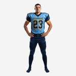 American football uniform supplier light blue and navy custom set with gold cuff band and front number 23 on a male model
