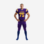 Front view of custom American football uniforms for schools in purple and gold with team name across the chest and number 75 in gold block digits