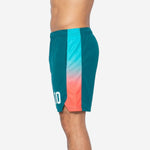 Opposite side view of teal and coral custom basketball shorts displaying the gradient side panel detail and elastic waistband with drawcord