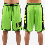 Close-up detail of sublimated black side panel with yellow lightning bolt graphic on neon green custom basketball shorts