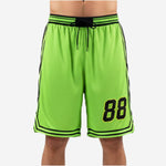 Custom basketball shorts with side panels in neon green and black, front view showing player number 88 and triple stripe hem band