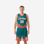 Custom basketball tournament uniforms in teal and coral orange with splash pattern, arched team name and number on jersey and matching shorts, front view
