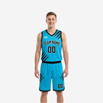 Custom reversible basketball uniform set cyan side front view with black slash graphics, V-neck binding, and matching shorts