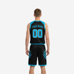 Black and blue reversible basketball uniform side view showing slash-panel design on jersey and shorts outer leg