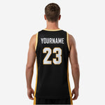 Opposite side view of sublimated black and gold basketball jersey highlighting gold panel running from armhole to hem