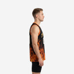 Adult male wearing a custom black and gold basketball jersey with orange flame sublimation print, gold team name, and white front number on black body