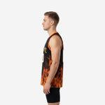 Side view of the custom black and gold flame basketball jersey showing orange armhole binding and full flame sublimation wrapping around the side panel