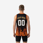 Opposite side view of the black and gold flame sublimated basketball jersey showing the continuous flame design across the side and hem