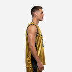 Front view of custom black and gold basketball jersey showing crew neckline with white and black binding stripe and sublimated team name