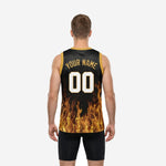 Opposite side view of the black and gold flame basketball jersey displaying the side panel sublimation in full