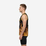 Side view of black and gold sublimated basketball jersey showing flame pattern wrapping around the side panel