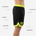 Back view of custom black and gold basketball shorts showing double side stripe, ribbed yellow waistband, and clean hem finish