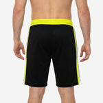 Front view of custom black and gold basketball shorts with neon yellow waistband stripe, white trim, and number 00 printed on left thigh