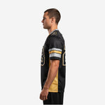 Left side view of black and gold American football jersey showing sleeve stripe detail and gold side panel construction