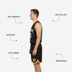 Side view of the gold reverse side of the reversible basketball uniform showing black trim binding at the V-neck and armhole