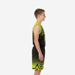 Youth boys wearing custom black and neon yellow-green basketball uniform set with halftone dot gradient, V-neck jersey and matching shorts, front view