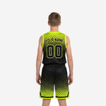 Second side view of youth black and neon yellow-green basketball uniform set showing halftone dot pattern on jersey and shorts with drawcord waistband