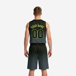 Right side view of custom black and green basketball uniforms showing full pinstripe design on jersey and shorts with elastic waistband detail