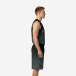 Side view of black and neon green custom basketball uniform set showing pinstripe pattern running from shoulder to hem on jersey and shorts