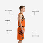 Back view of custom black and orange basketball uniform showing player name and number on jersey back