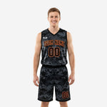 Custom black and orange basketball uniforms in digital-camo print showing full front and back of the jersey and shorts set