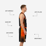 Close-up detail of black basketball shorts with orange elastic waistband, interior drawcord, orange and gold side panel stripe, and sublimated player number on lower right leg