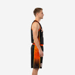 Side view of black and orange basketball uniform set showing continuous orange and gold side panel running from jersey armhole down through matching shorts leg