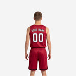 Side view of custom black and red reversible basketball uniform showing diagonal slash panel transition from jersey to matching shorts