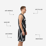 Back view of custom black and white reversible basketball uniform showing back name and number placement above elastic waistband on matching shorts