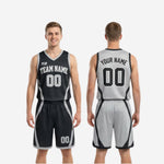 Detail view of matching basketball shorts waistband and leg number placement on black and white reversible basketball uniform set