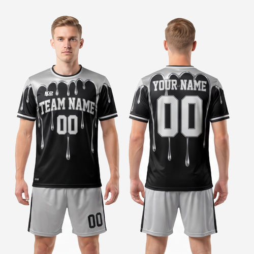 Back view of custom black and silver soccer uniform showing player name and number print zones on jet black sublimated jersey
