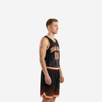 Men's black basketball uniform with orange arched team name and flame sublimation on V-neck jersey front