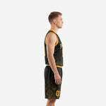 Front view of custom black basketball uniform with arced gold team name and number on damask-print jersey and matching shorts